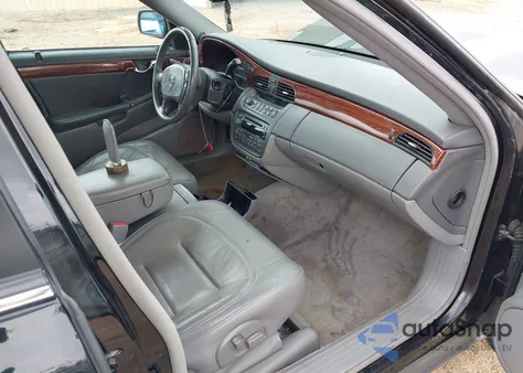 2003 Cadillac Deville Standard z USA, uszkodzony, nr VIN 1G6KD54Y83U130019